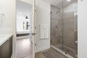 Combined shower/tub, hair dryer, towels, soap