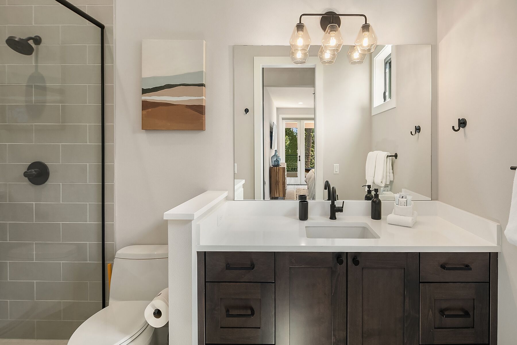 7 Pines Retreat: - 2nd floor master bath with a tile shower.