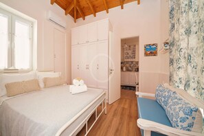 1 habitación, tabla de planchar con plancha, wifi gratis y ropa de cama 