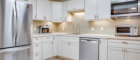 Fridge, microwave, dishwasher, coffee/tea maker