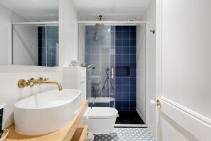 Bathtub, hair dryer, towels