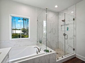 Shower, hair dryer, towels, soap