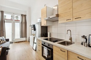 Réfrigérateur, four, plaque de cuisson, lave-vaisselle