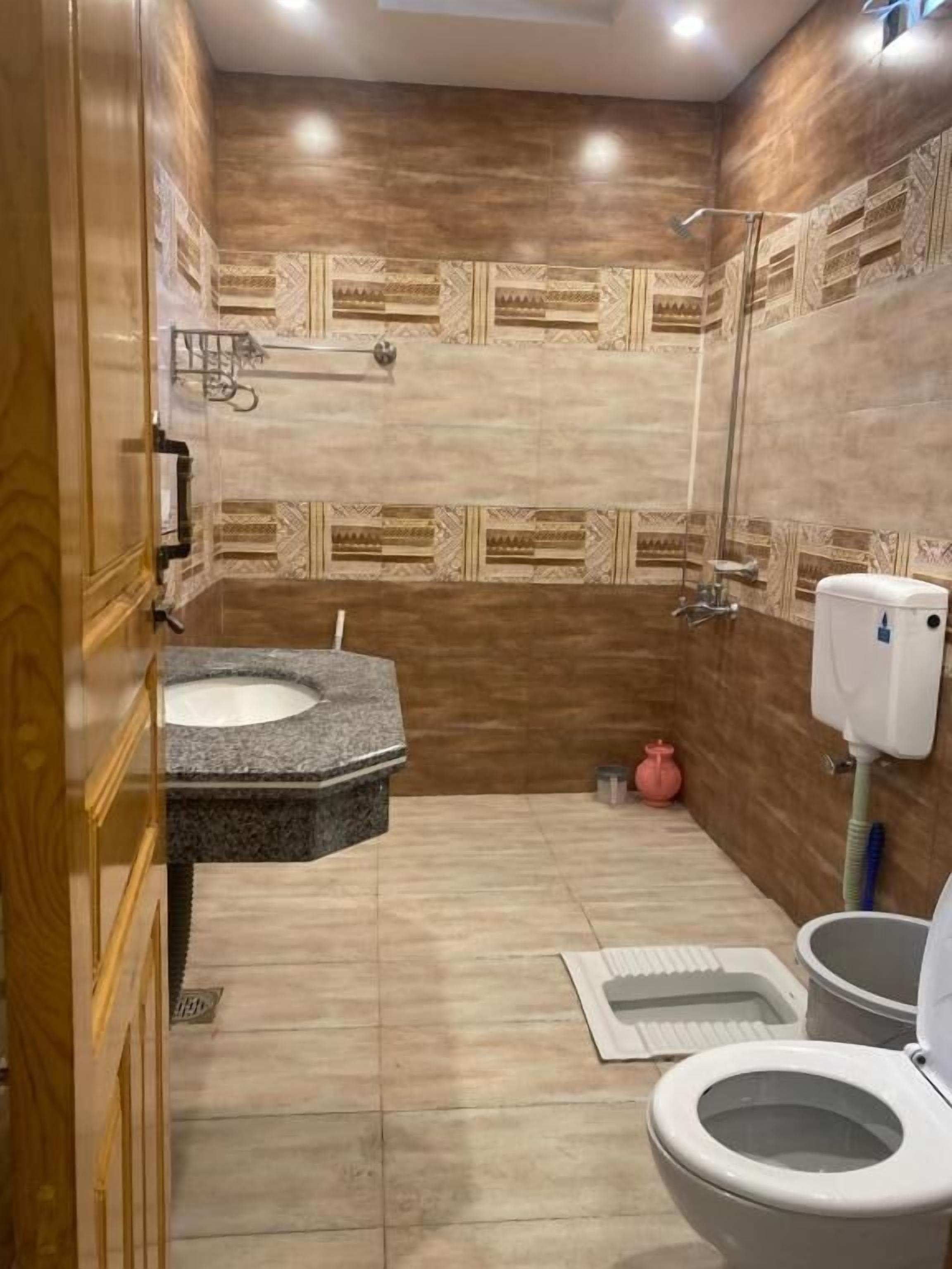 Shower, designer toiletries, towels, soap