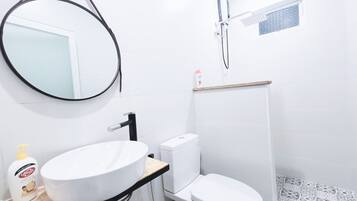 Hair dryer, towels, soap, shampoo