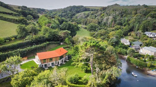 Goodshelter Bay -  a large modern waterfront house with private slipway