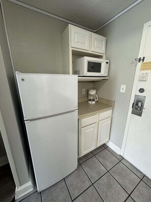 Fridge, microwave, coffee/tea maker, toaster