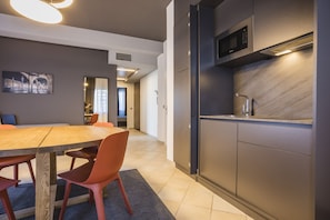 Deluxe Apartment, 2 Bedrooms | Private kitchen | High chair - Residence 9 Line (Cervia)
