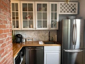 Fridge, microwave, dishwasher, coffee/tea maker