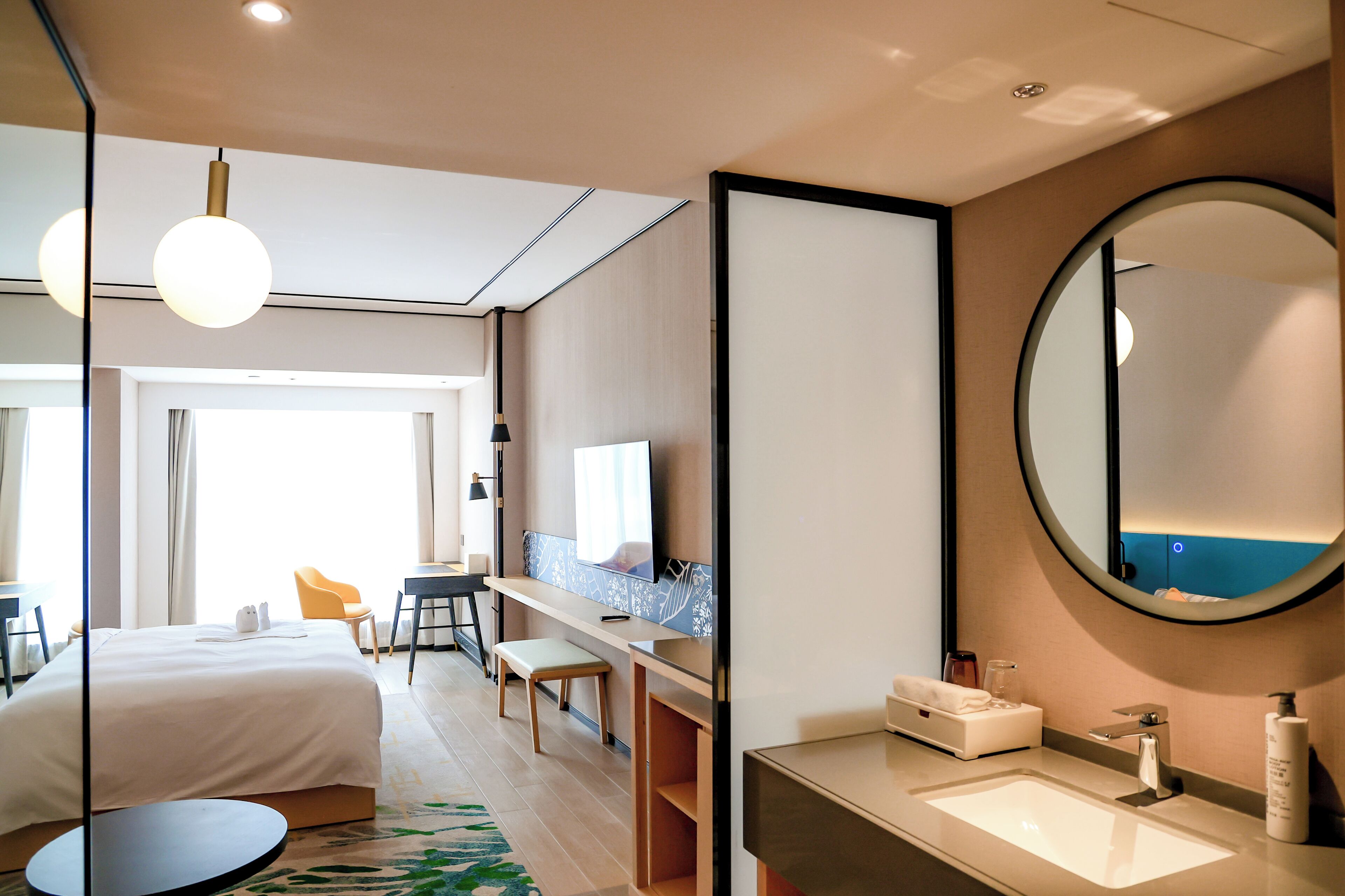 deluxe room, 1 king bed | down duvets, in-room safe, desk, blackout curtains