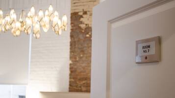 A room with a sign indicating "ROOM NO. 7".