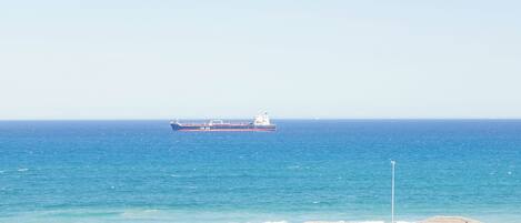 On the beach, beach towels