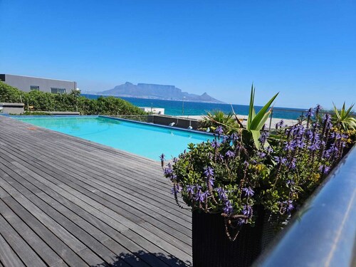 Beachfront couples paradise overlooking Robben Island and Atlantic ocean.