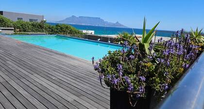 Beachfront couples paradise overlooking Robben Island and Atlantic ocean.