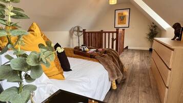 1 bedroom, desk, iron/ironing board, travel crib