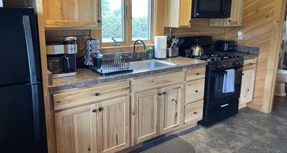 Stay on Kingdom Trails in a one bedroom cabin!