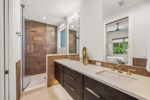 Combined shower/tub, eco-friendly toiletries, hair dryer, towels