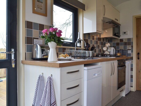 Dishwasher, highchair, cookware/dishes/utensils