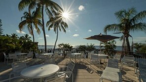 Outdoor dining - End Unit with ocean views and Juliet Balcony. (Key Largo)