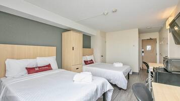 Economy Room, 2 Double Beds | 1 bedroom, free WiFi, bed sheets