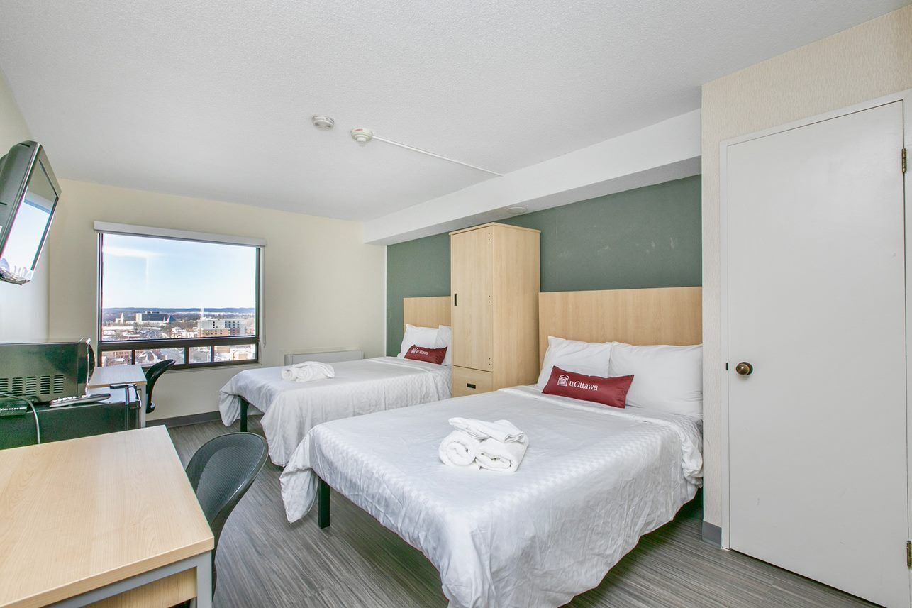 Economy Room, 2 Double Beds | Free WiFi, bed sheets