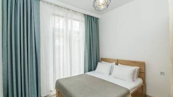 2 habitaciones y ropa de cama