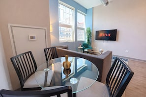 Dining - Stylish 2BR Apartment with Patio and Gym Near McCormick Place & Lakefront Trail (Chicago)