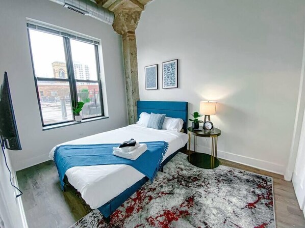 2 habitaciones, tabla de planchar con plancha y cuna de viaje 