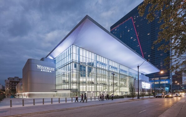 Stunning sports facility with a sleek, angular design and large entrance.