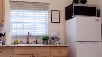 Fridge, microwave, coffee/tea maker, toaster