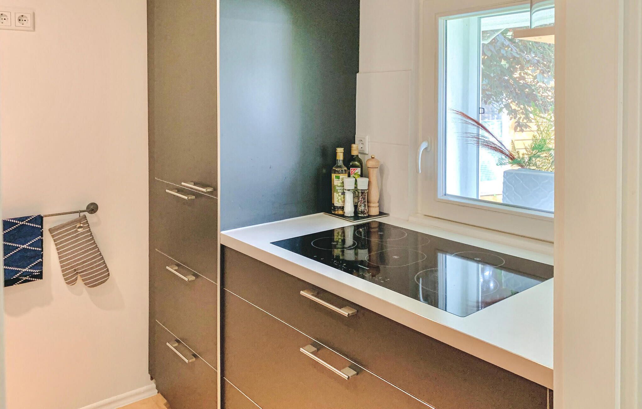 Fridge, stovetop, dishwasher, coffee/tea maker