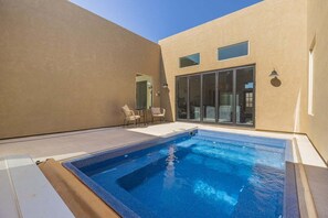 Et oppvarmet basseng