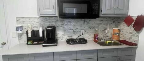 Fridge, microwave, coffee/tea maker, toaster