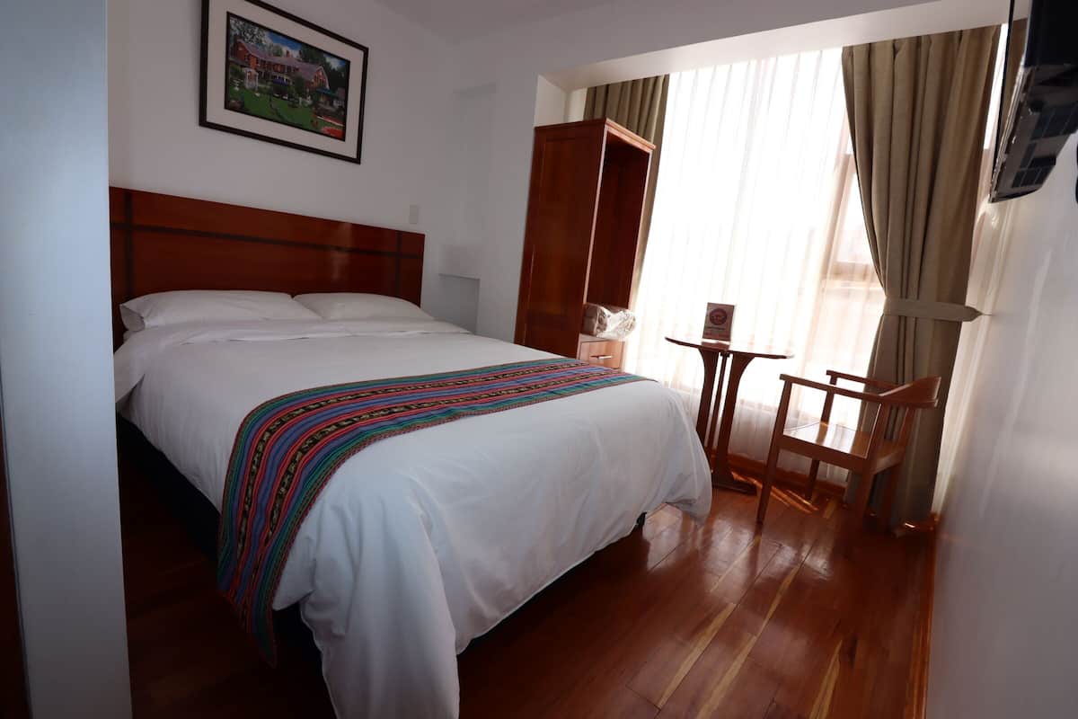 Habitación Individual Estándar | Desk, individually decorated, individually furnished, bed sheets