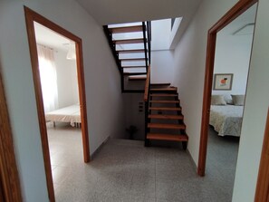 4 bedrooms, desk, iron/ironing board, travel cot
