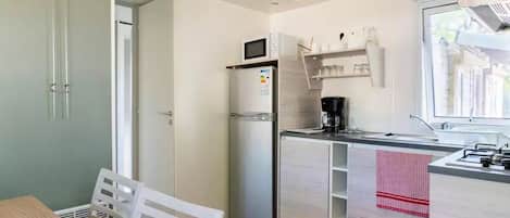 Fridge, microwave, cookware/dishes/utensils