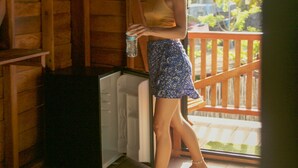 A wooden cabin with a balcony, a window, and a door. - El Regalo El Cuyo (El Cuyo)