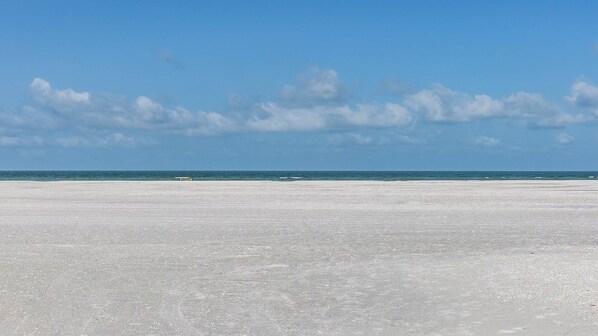On the beach, beach towels