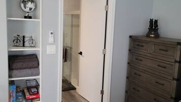 1 bedroom, desk, iron/ironing board, travel crib