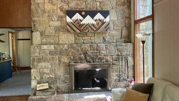 Smart TV, fireplace, books