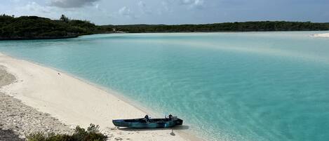 On the beach, sun loungers, beach towels