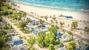 On the beach, sun loungers, beach towels