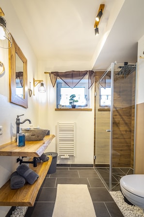 Shower, bathrobes, towels, soap