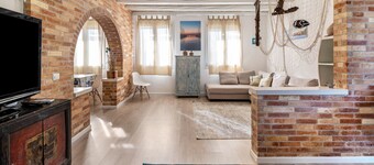Studio Apartment 'Appartamento Brussa Beach' with Private Terrace, Wi-Fi and Air Conditioning