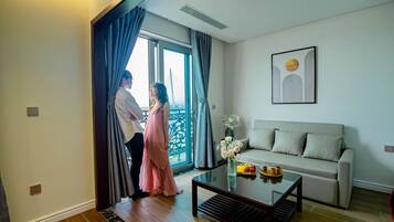 Deluxe Apartment | Living area | 32-inch Smart TV with cable channels, TV, printers