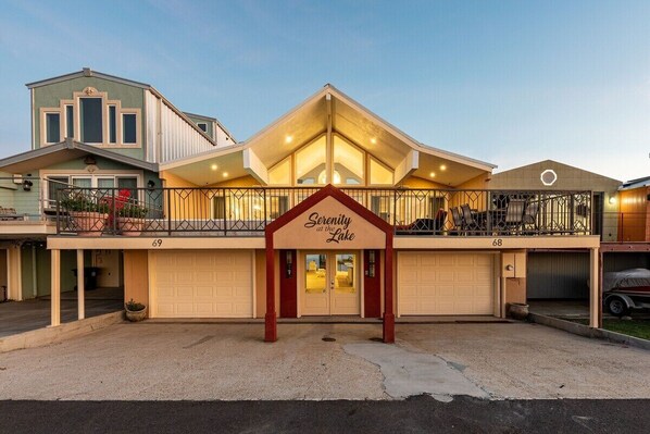 A building with a prominent entrance labeled "Serenity at the Lake."