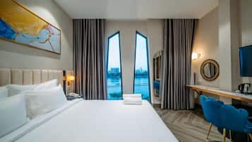 Premium bedding, memory foam beds, minibar, in-room safe