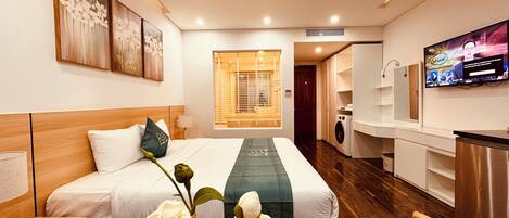 Deluxe Studio | In-room safe, desk, laptop workspace, blackout curtains