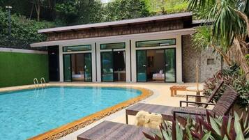 Family Room | Free minibar, in-room safe, individually decorated