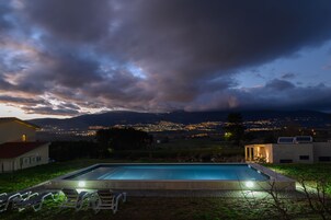 Seasonal outdoor pool, open 8:30 AM to 8:30 PM, pool umbrellas